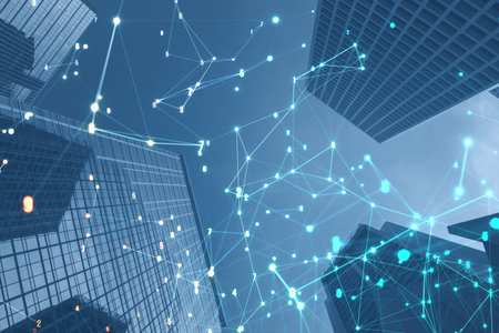 Glowing polygonal coding mesh on blurry city wallpaper. Technology and pattern concept. double...