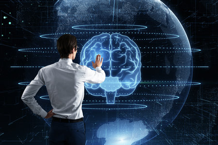 Back view of businessman using creative glowing polygonal brain sphere hologram on blurry...