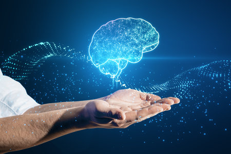 Close up of male hands holding creative glowing polygonal brain hologram on blurry background....