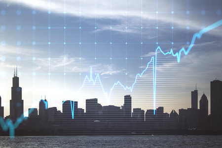 Glowing blue business graph on blurry city background. Finance, trade and success concept. double exposureの写真素材