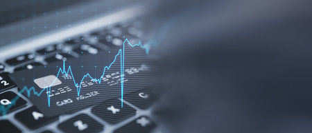 Close up of laptop with bank card and glowing upward business chart on blurry wide perspective...