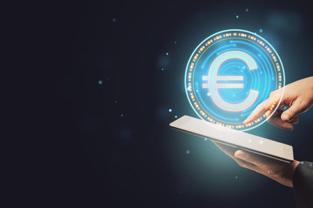 Close up of hand pointing at smartphone with digital round euro sign on dark background with blurry mock up place. Online banking, cryptocurrency and finance conceptの写真素材