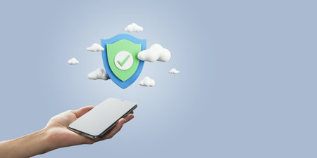 Close up of female hand holding mobile phone with digital shield and clouds on light blue background...