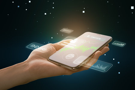 Creative digital money concept with female hand holding cellphone with online banking charts and...