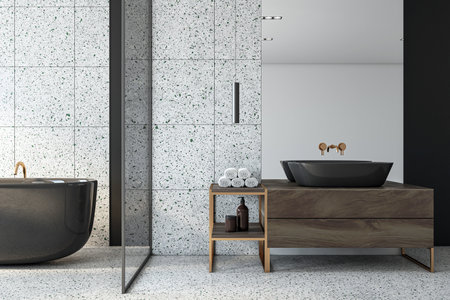 Front view of modern loft bathroom interior design with stone gray floor and walls, black bath and...