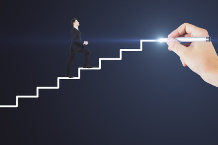 Abstract image of businessman climbing hand drawn stairs on dark background. Teamwork, success and career development conceptの写真素材