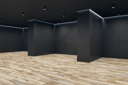 Clean black concrete gallery interior with wooden parquet flooring and mock up place on wall. Art and display concept. 3D Renderingの写真素材