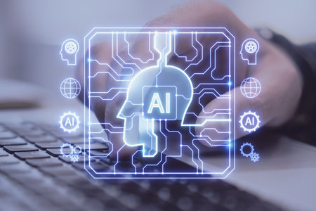 Close up of male hands using laptop keyboard with creative AI head outline hologram with circuit on blurry background. Double exposureの写真素材