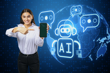 Attractive happy young European businesswoman pointing at mobile phone with creative glowing robot...