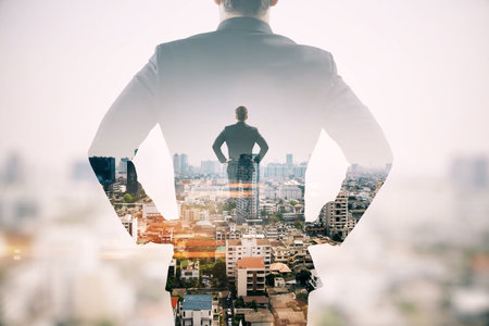 Back view of young European man standing on abstract city background. Success, future and CEO...