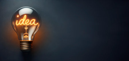 Light bulb on dark background with IDEA word inside and empty place. Generative AIの素材