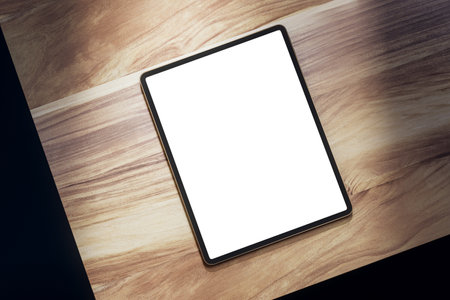 Top view of empty white tablet on wooden table. Mock up, 3D Rendering