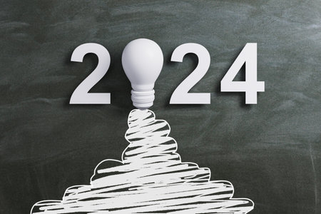 White lightbulb drawing and 2024 on chalkboard, depicting strategic planning for the future. 3D Renderingの写真素材