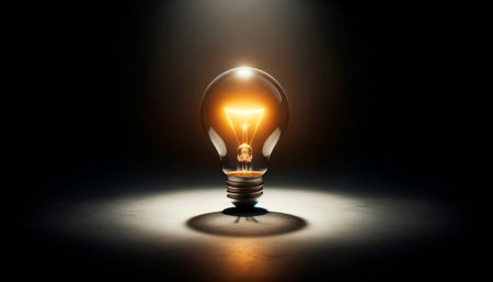 Light bulb glowing in dark room, concept of idea and creativity. Generative AIの素材