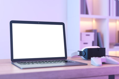Creative pink designer gamer's desk with mock up place on white laptop screen vr glasses and other...