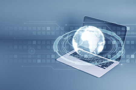 Close up of laptop with creative glowing globe hologram on blurry background. Metaverse, device, map and global network concept. 3D Renderingの写真素材
