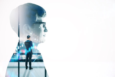 Back view of young European male worker in suit standing, and thinking on blurry night city background through window with forex chart. White mock up place, Double exposureの写真素材