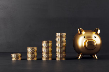 Creative golden piggy bank with stacked coins on black wall background. Money safe and investment concept. Mock up place for your advertisement, 3D Renderingの写真素材