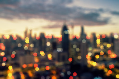 Abstract blurry bokeh lights night city background. Skyline and landing page concept