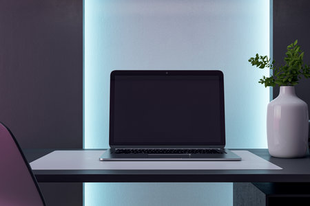 Minimalist workspace with blue backlight, sleek desk, and decorative greenery. 3D Renderingの写真素材