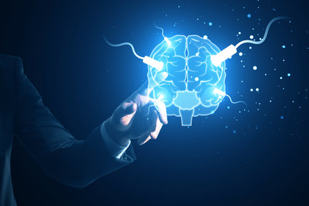 Hand presenting a digital brain with glowing neural links on a dark backdrop. Interaction concept