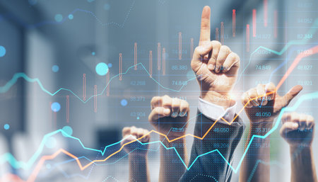 Various male and female hands showing thumbs up on blurry office interior background with forex...