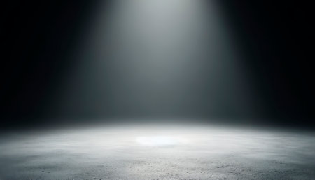 Spotlight on polished concrete creating a stark contrast of light and shadows. Generative AIの素材
