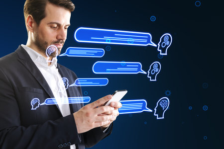 Attractive young European businessman using smartphone with creative chat GPT hologram with speech...