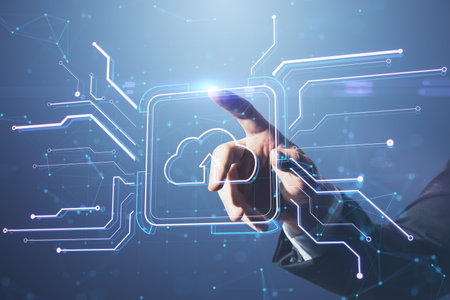 Close up of businessman hand pointing at creative square circuit button hologram with cloud icon. Technology and cloud computing concept. Double exposureの写真素材