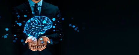 A person in a suit holding a glowing blue brain, digital style, on a dark background, concept of intelligence and innovation. Generative AIの素材