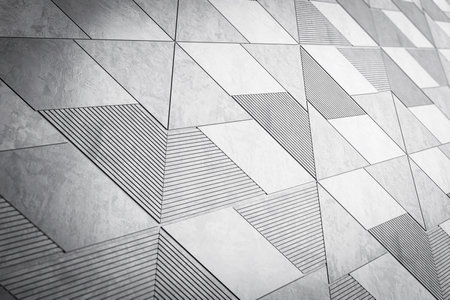 An abstract geometric pattern with varying textured triangles, modern and monochromatic, against a plain background, concept of minimalism. 3D Renderingの写真素材