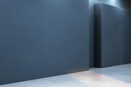 Modern empty gallery interior with dark blue walls, terrazzo flooring, and spot lighting, concept of exhibition space. 3D Renderingの写真素材