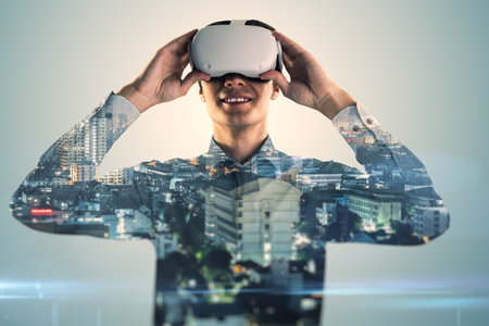 Attractive young European businessman with VR glasses standing on blurry city background. Metaverse...