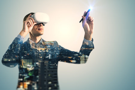 A man using virtual reality headset with an overlay of cityscape, against a light background, depicting technology conceptの写真素材