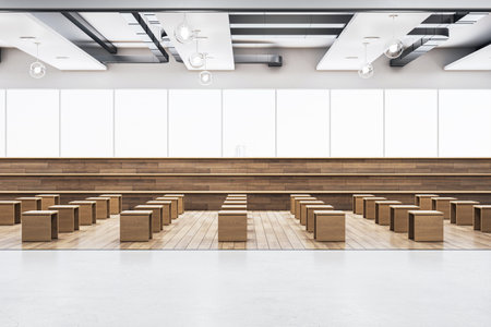 A spacious, modern auditorium with rows of wooden seats and steps, a conceptual design for education, set against a bright background. 3D Renderingの写真素材