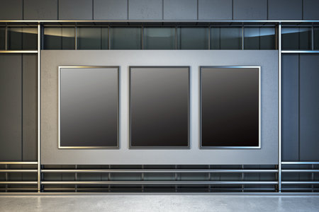 Three blank advertising billboards on a dark metallic building wall, indoor setting, with copyspace...