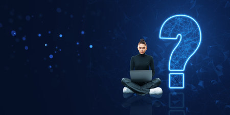 A woman sits with a laptop on a dark digital background with a large glowing question mark. Concept...