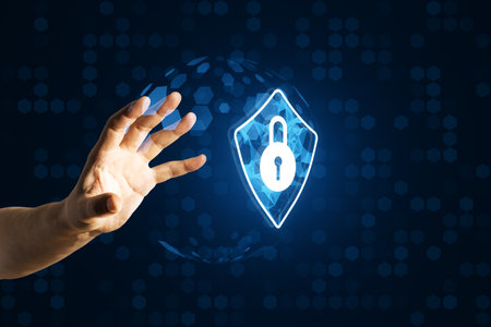 A hand reaching out towards a holographic lock icon, symbolizing cybersecurity. The background...