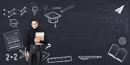 Female student holding books in front of a chalkboard with various educational icons drawn in chalk....
