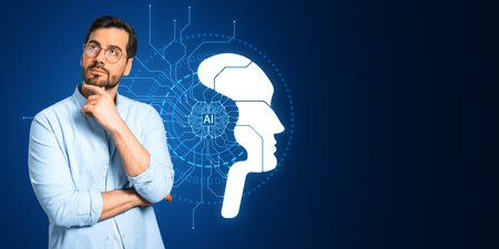 Thoughtful young European businessman with creative AI head outline on dark background with mock up place. Artificial intelligence and machine learning conceptの写真素材