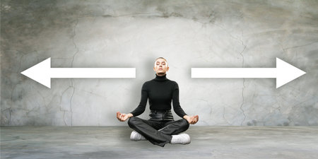 Businesswoman meditating between large white arrows on a cracked concrete wall background. Concept...