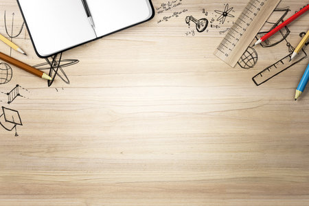 Top view of a wooden desk with an open notebook, pencils, ruler, and hand-drawn sketches. Ideal for...