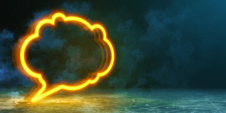 Neon orange speech bubble icon glowing on a dark electric background. Illuminated, empty, and clean....
