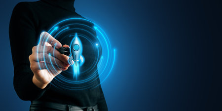 Businesswoman holding a digital rocket icon, symbolizing the launch of a startup. Blue neon backdrop. Concept of business, technology, and successの写真素材
