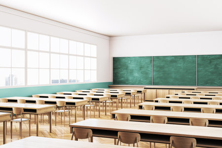 Empty classroom interior with wooden tables, chairs, large windows, and a green chalkboard. Bright morning light, clean and modern design. 3D Renderingの写真素材