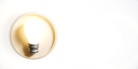 A glowing lightbulb in a round fixture, isolated on a white background. The bulb symbolizes ideas...