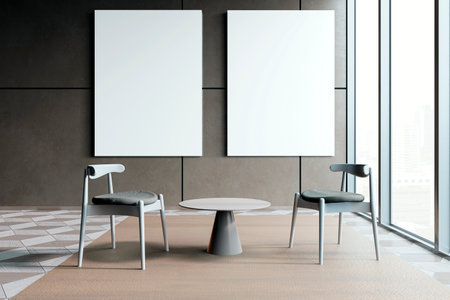 Modern waiting area with two chairs and a table, featuring two blank posters on a dark wall, large windows in the background. 3D Renderingの写真素材