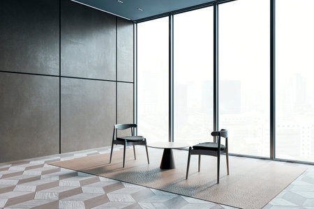 Modern, empty waiting area in an office with two chairs and a small table, large windows, and a cityscape view in the background. 3D Renderingの写真素材