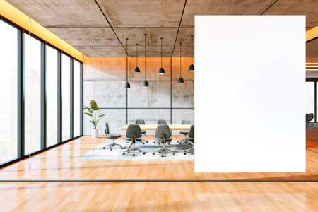 Modern conference room with large windows, a wooden table, chairs, and a vertical white mockup canvas. Daylight-filled office interior. 3D Renderingの写真素材