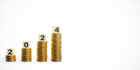 Stacked golden coins with wooden blocks showing the year 2024, on a white background. Concept of financial growth and future investment. 3D Renderingの写真素材